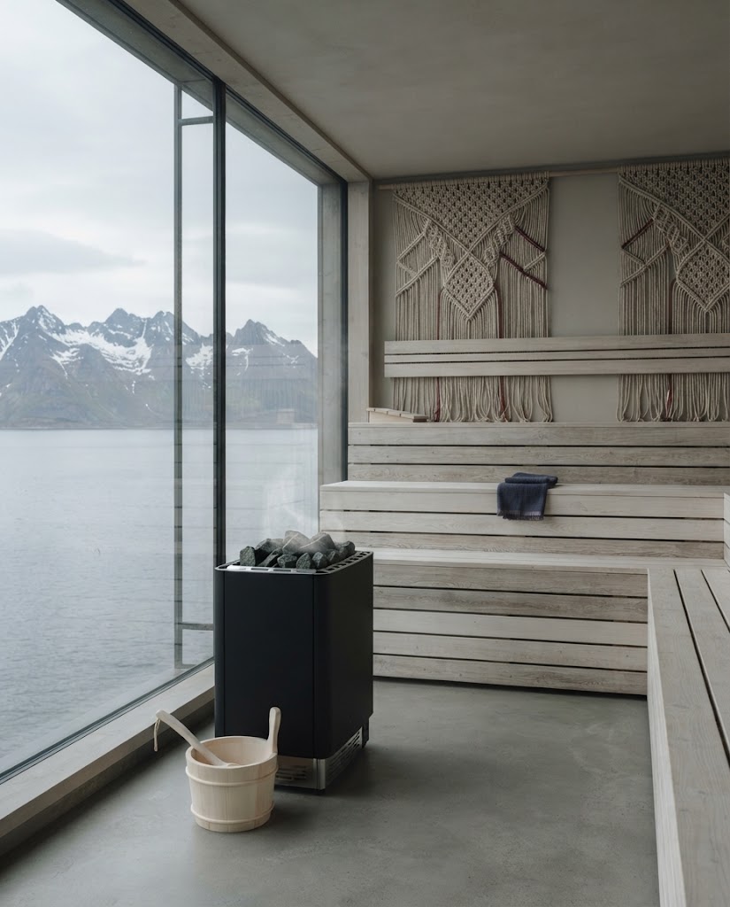 Artist's impression of a pale timber sauna with a panoramic window onto the sound and the mountains